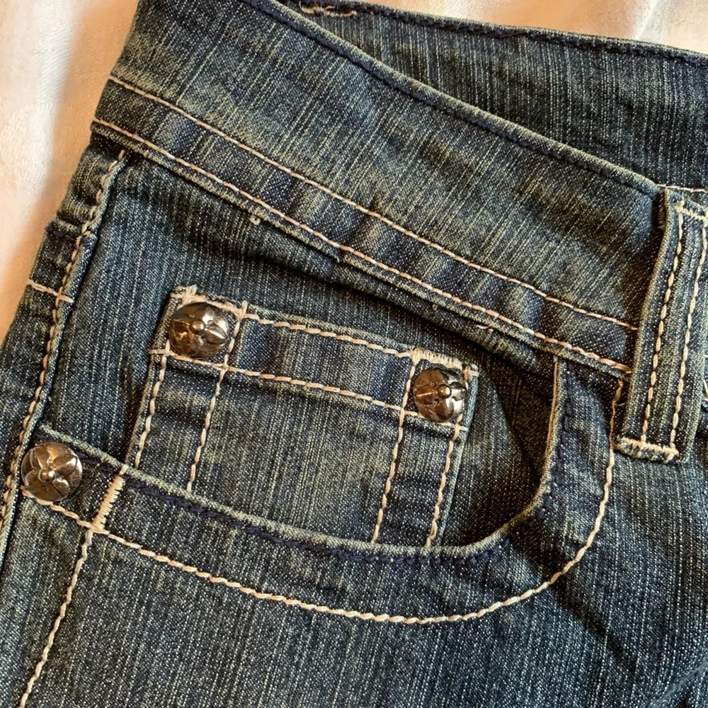 Daniel Jeans Size 3/4 dark denim with back pocket rhinestone embellishments
